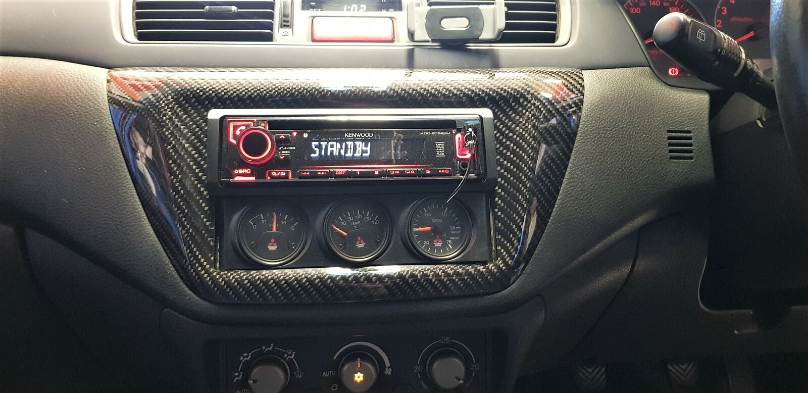 Carspeed Carbon Fiber Stereo Surround Mitsubishi Evo 7 8